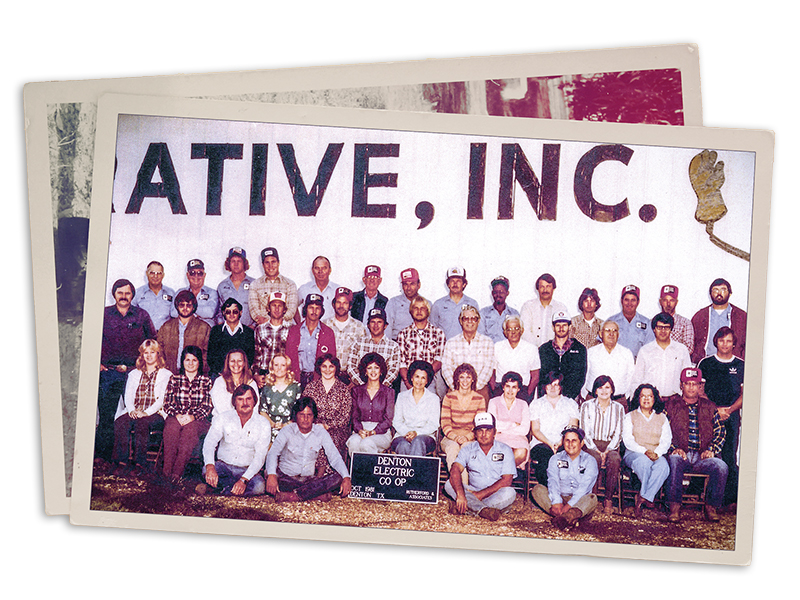 This photo from 1981 shows the Employees at CoServ, then known as Denton County Electric Cooperative,
posing at the old location at Interstate 35 and U.S. 380 in Denton. Note the Employees who are still here:
Fourth row: third from left: Ronny Allen, fourth from left: Britt Howard
Third row: second from left: Kevin Vincent
Second row: second from left: Brenda Walker, eighth from left: Janet Knight, eleventh from left: Terri Jeter
Not pictured: Tommy Richards