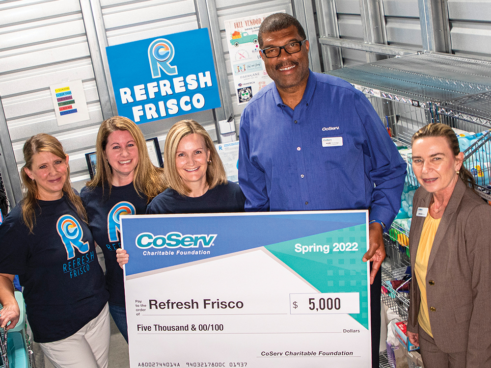 The CoServ Charitable Foundation distributed a grant to Refresh Frisco that helped the organization purchase hygiene items.  
Left to right:  Kristin Cagle, Elizabeth Watkins, Anja Newbury, CoServ Electric District 4 Director Mark Rutledge, CCF and Outreach Coordinator Jennifer Ebert. Photo by KEN OLTMANN