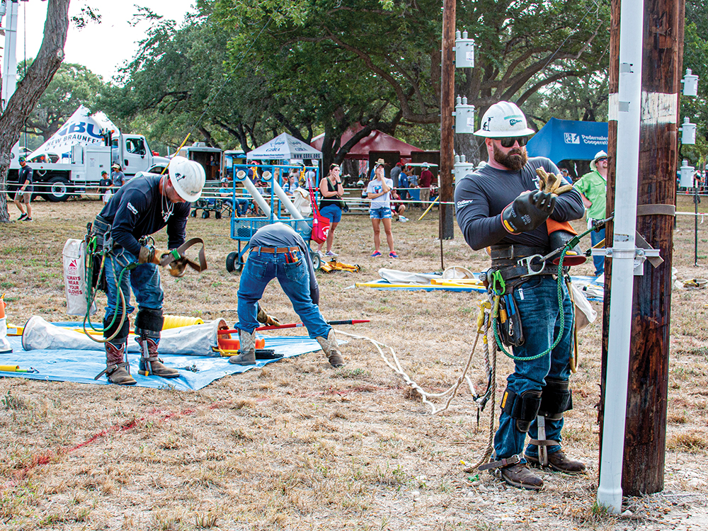 Mitchell Bridges and Jeshua Price change out equipment during the mystery event.