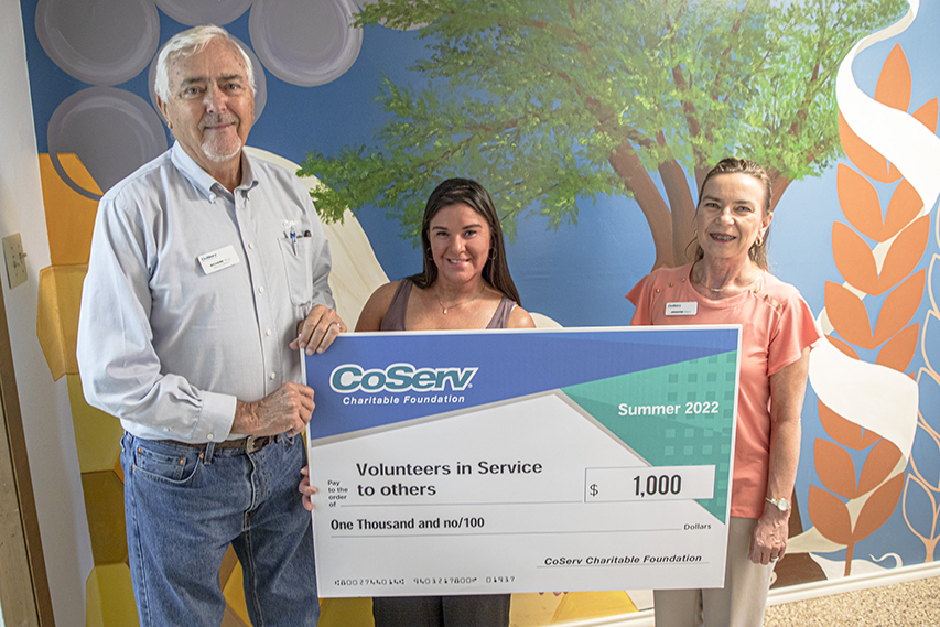 VISTO CCF social service agency grant in Gainesville. Grant goes to help pay CoServ Members' bills. The photo shoot also includes their executive director Bekki Jones and CoServ Board Member Richard Muir.