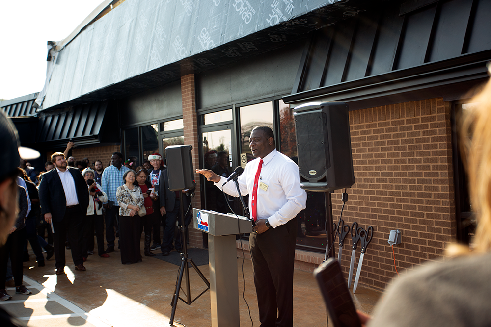 Denton city Mayor Gerard Hudspeth spoke at the ribbon cutting ceremony for Our Daily Bread's new facility unveiling.	
