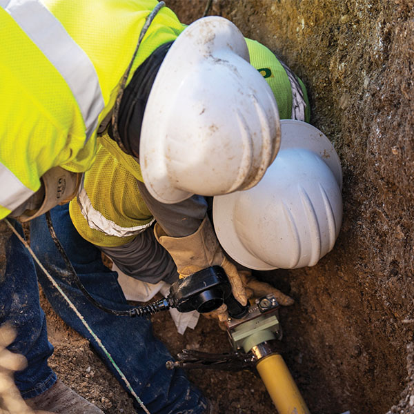 CoServ gas crew (Steven Mayer, Jesse Garcia Romo and David Lanzi put a new cap on a 2 inch gas line to make way for the widening of First St in Propsper.