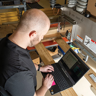 Engineers develop new automated technology to make the grid smarter. Photos by BRIAN ELLEDGE