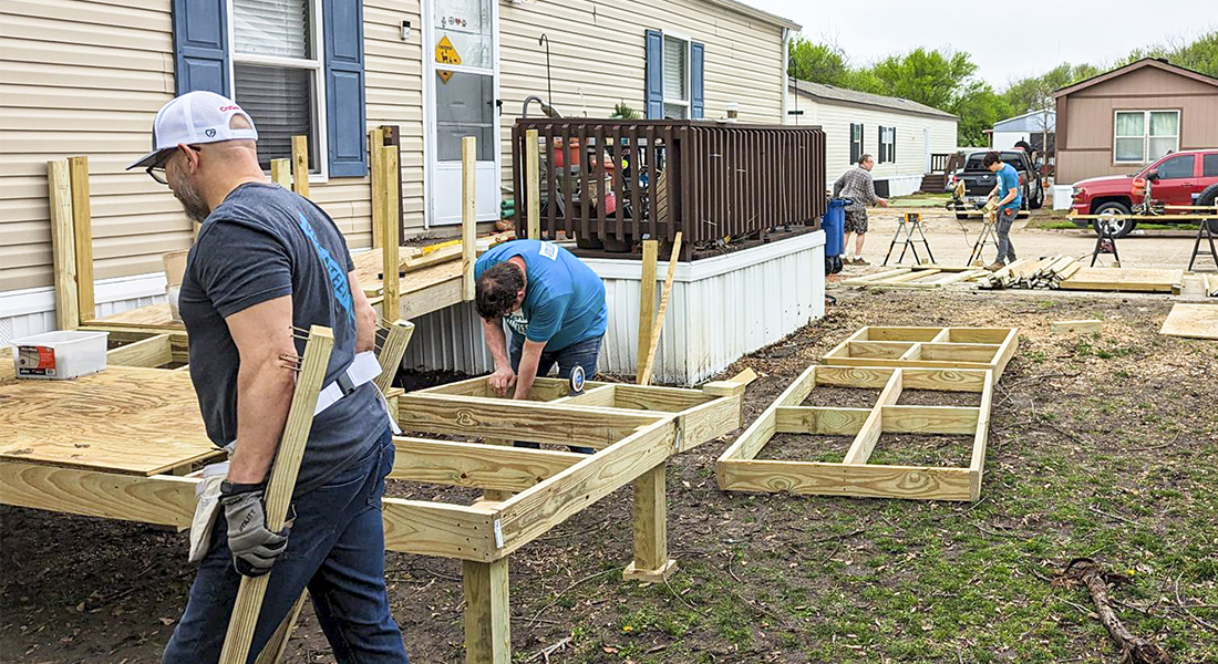 CoServ Employees volunteered to build a ramp at a CoServ Member's home in Little Elm. Photos by NICHOLAS SAKELARIS/CoServ (Except where noted)