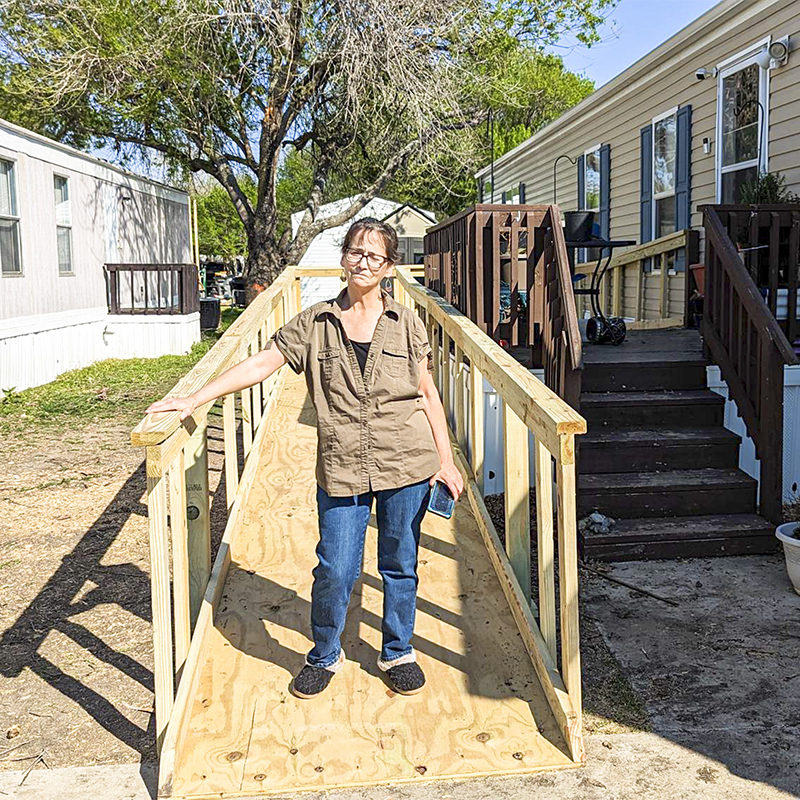 CoServ Member Delia Stone poses on her new ramp at her Little Elm home. Photo by CONAN TEARNEY/CoServ