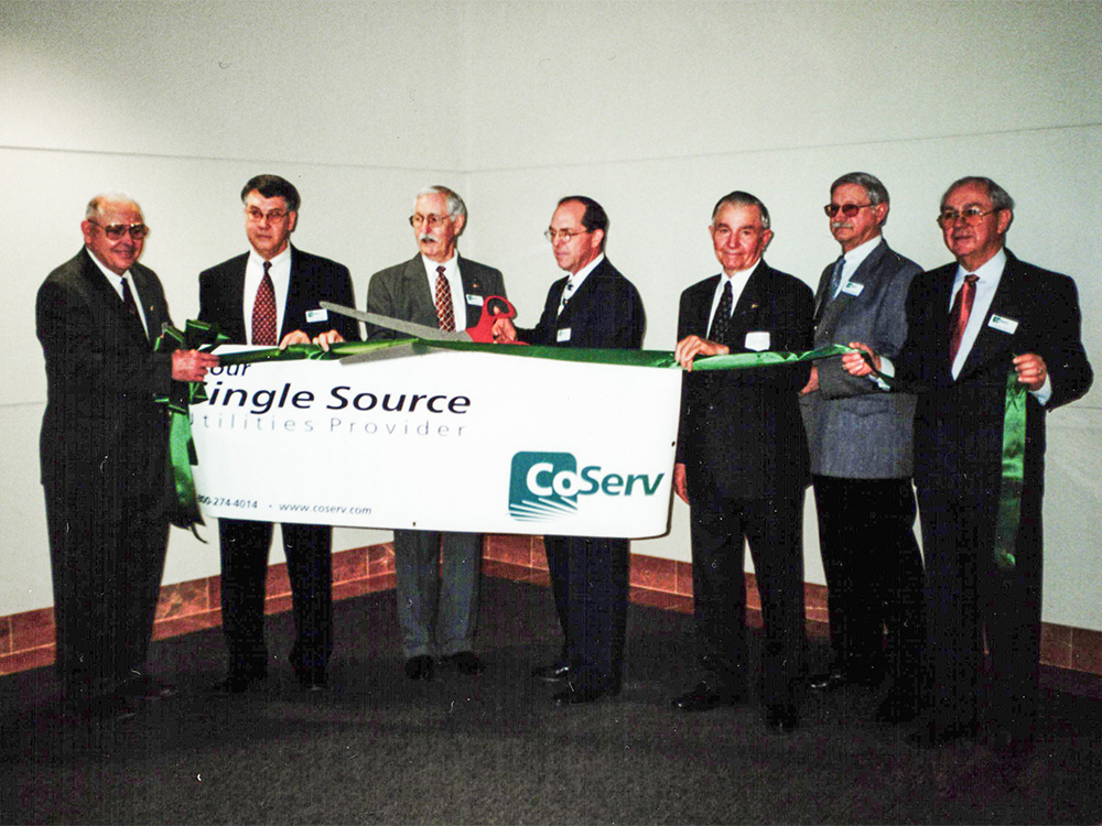 CoServ's Board of Directors when the co-op changed its name to CoServ in the late 1990s. He's pictured third from right. COSERV ARCHIVES