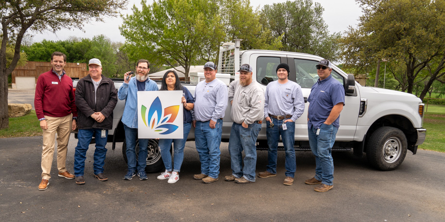 CoServ donates a Ford F250 truck to Children's Advocacy Center for North Texas to use in the maintenance of their facilities.