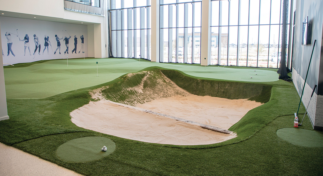 The putting green has a realistic sand trap.