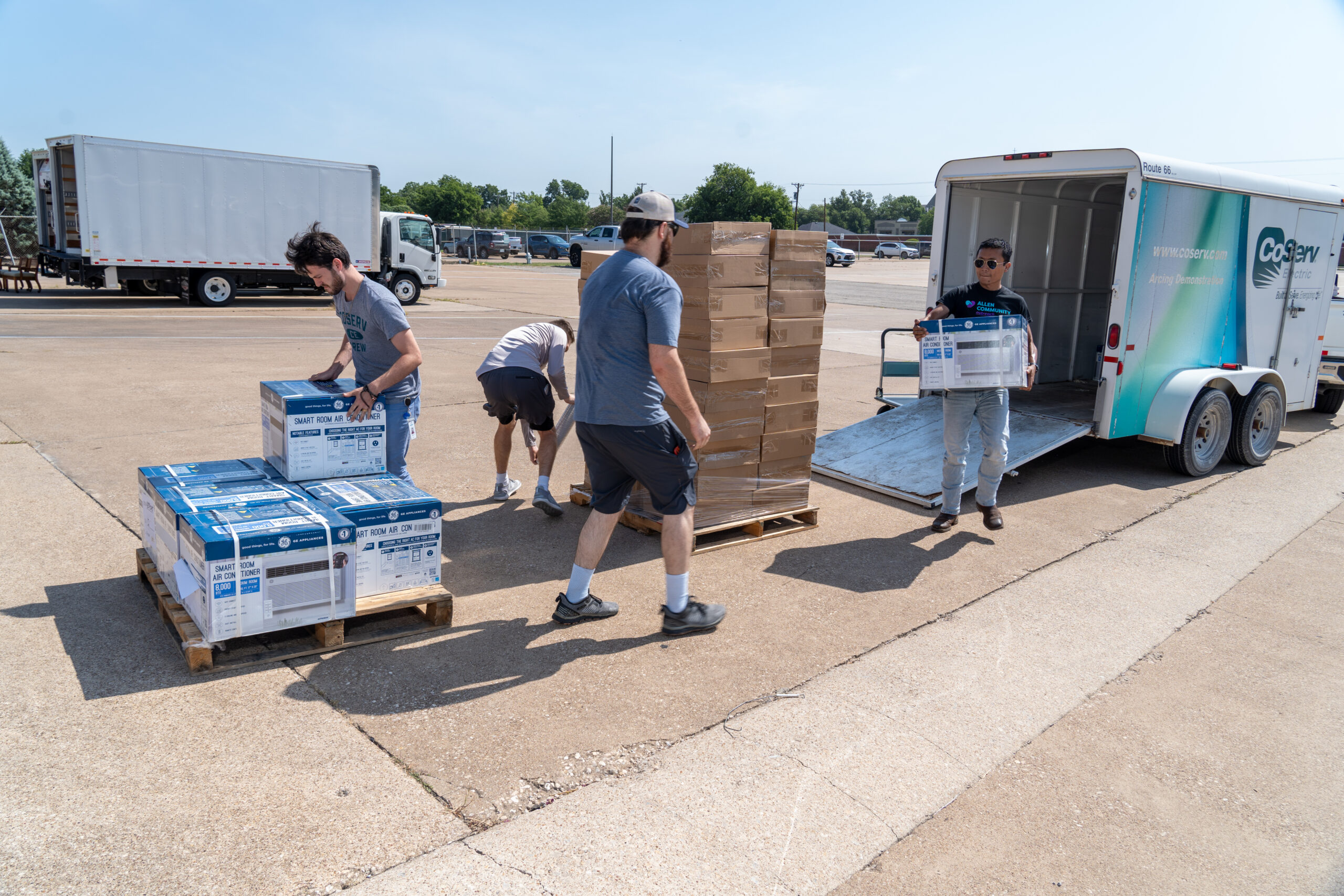 The CoServ Charitable Foundation delivers fans and AC Window units to All Community Outreach in Allen for distribution to families that need them. Photo by BRIAN ELLEDGE/CoServ