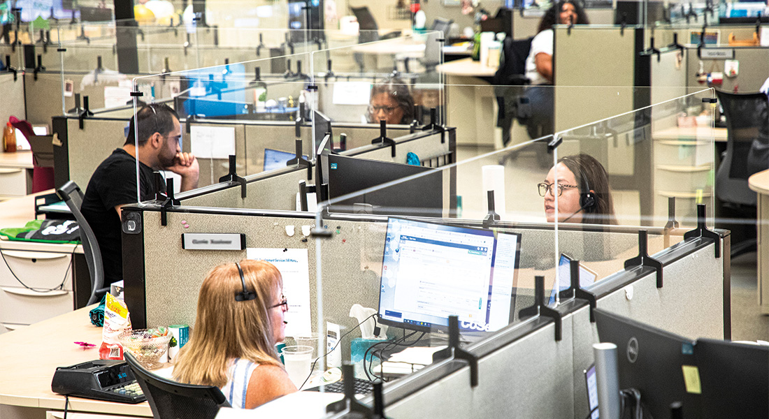 Contact Center assisting Members. Photos by KEN OLTMANN