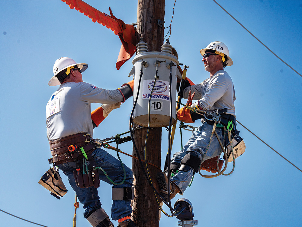 CoServ's Senior Journeyman Team, including Supervisor Chris Hammonds (left) and Alex Garza (right), won third place in their division.