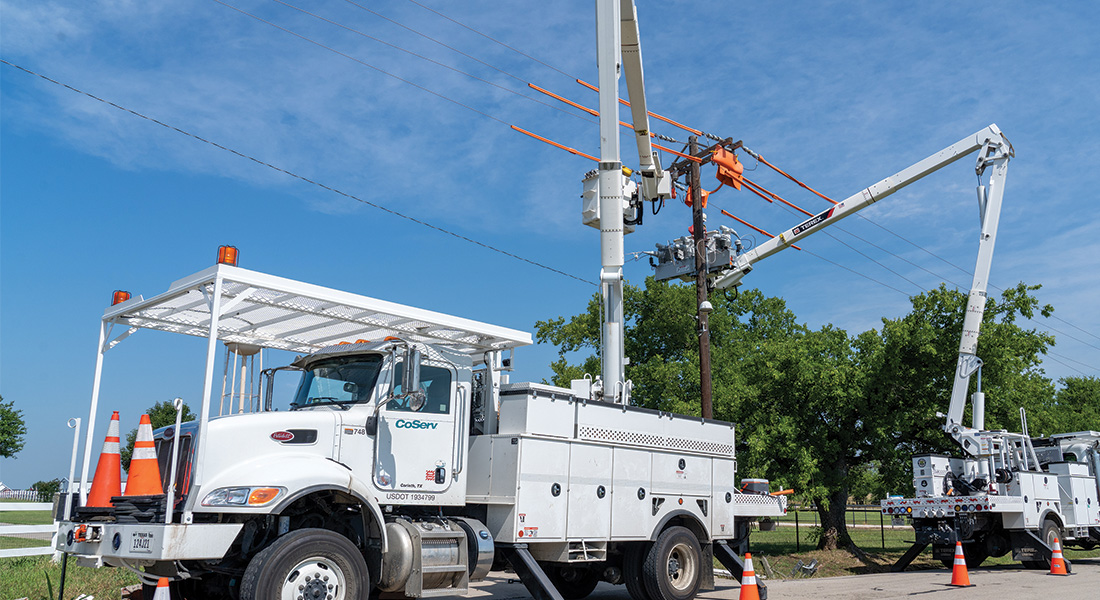 CoServ linemen install a new smart recloser in Aubrey. Photo by BRIAN ELLEDGE