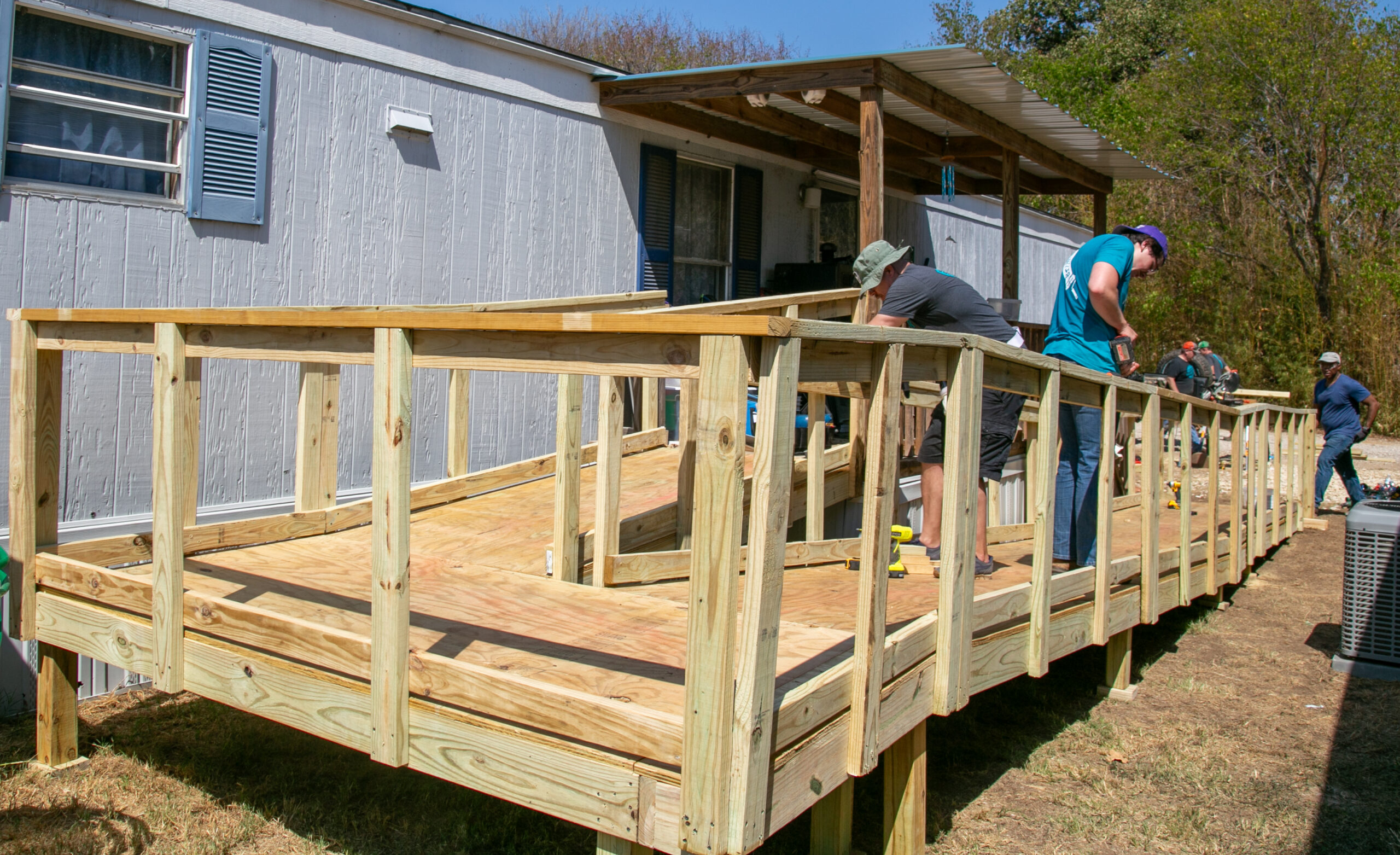 CoServ Employees spent a recent Saturday building a ramp in Lake Dallas. (Photos by Nicholas Sakelaris/CoServ unless otherwise noted)