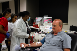 Power Red donor at CoServ fall blood drive