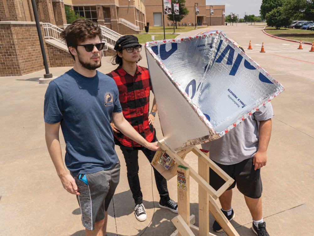 Students calibrate a device that measures the speed of the Earth.