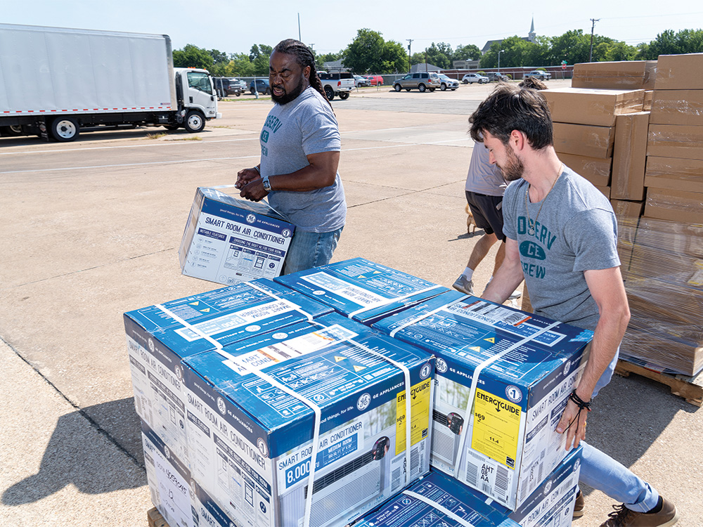 CoServ Charitable Foundation delivers fans and AC Window units to All Community Outreach in Allen for distribution to families that need them.