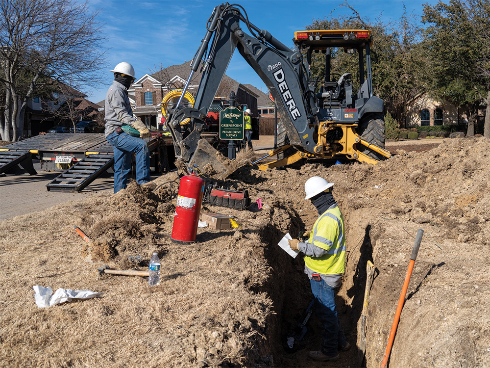 CoServ gas crew (Steven Mayer, Jesse Garcia Romo and David Lanzi put a new cap on a 2 inch gas line to make way for the widening of First St in Propsper.
