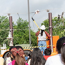 CoServ Energy Education Specialist Alphonso Williams and Energy Education Lead Randy Copeland present the CoServ Arcing Demo to students at Denton ISD's Scholar Camp at Ginnings Elementary..