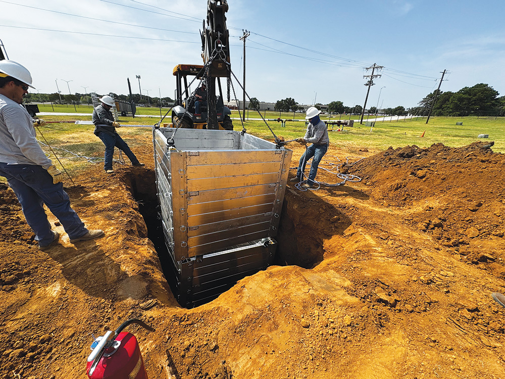 CoServ’s new Build-A-Box shoring equipment keeps crews safe when working in a hole. Photo courtesy of CoServ Gas Crew