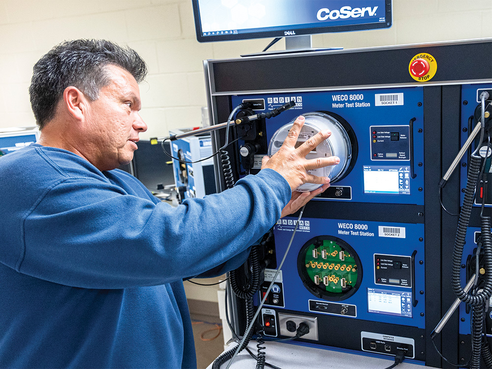 Senior Meter Tech Jeff Villareal tests an electric
meter in the shop at CoServ headquarters.