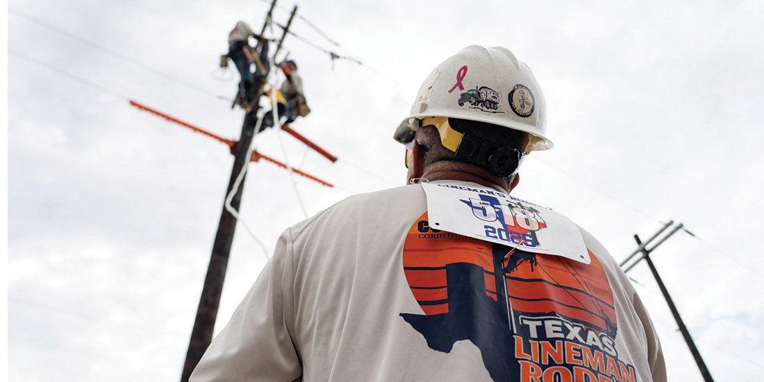 The CoServ Senior Journeyman Team performs the Disconnect and Arrestor Change. Luke Hawkins holds the hand line on the ground while Alex Garza and Chris Hammonds work on the pole. Photos by BRIAN ELLEDGE