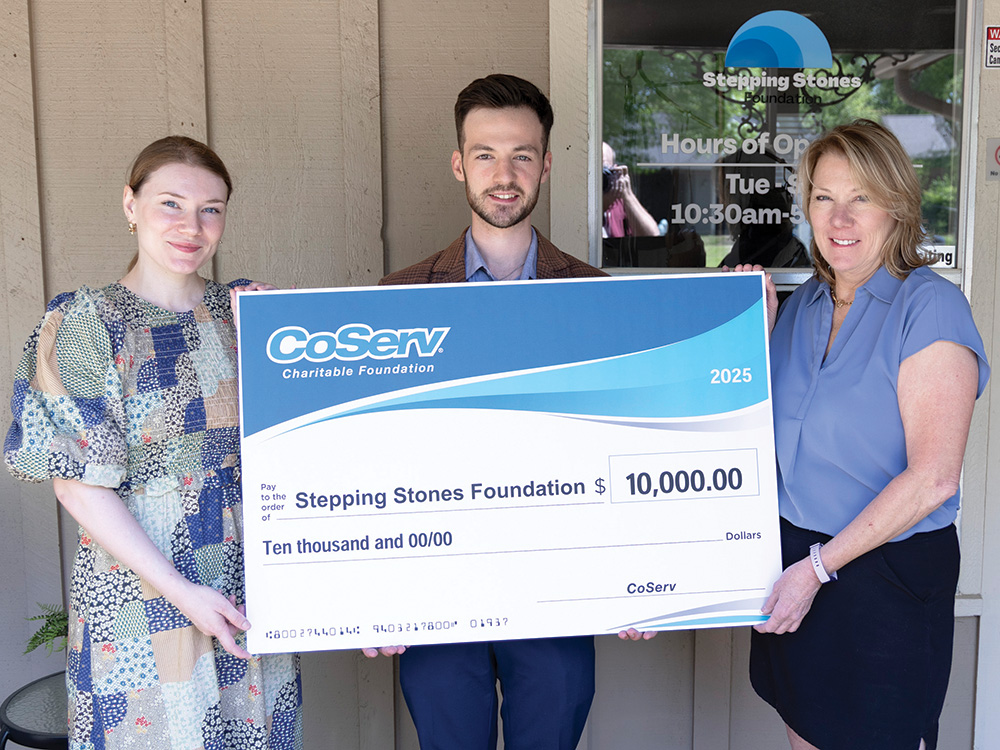 (L to R):  Katie Bynum and Christina Bynum-Breaux accept a CCF grant donation presented by Walker Sims, Event Specialist (CoServ). Photo by KEN OLTMANN/CoServ