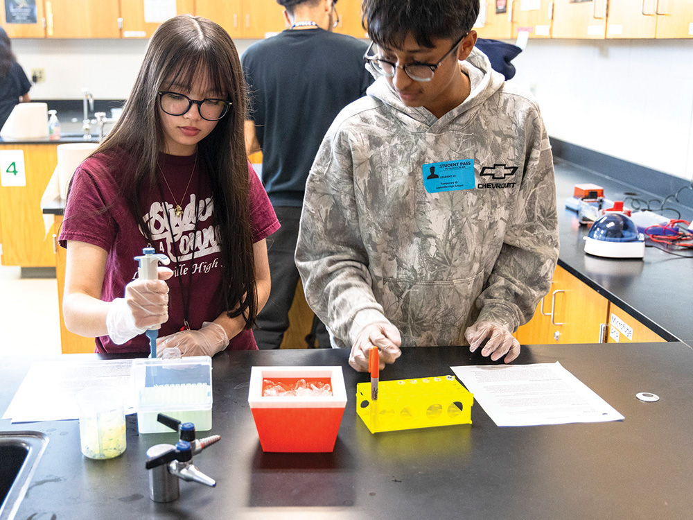 Lewisville High School teacher Rebecca DeLozier uses a Lewisville Education Foundation (LEF) grant funded by the CoServ Charitable Foundation (CCF) to teach students about DNA.