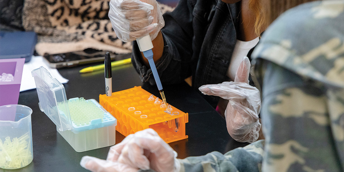 Lewisville High students use lab equipment to perform experiments and conduct research with DNA to identify bacteria strains that are resistant to antibiotics. Photos by KEN OLTMANN
