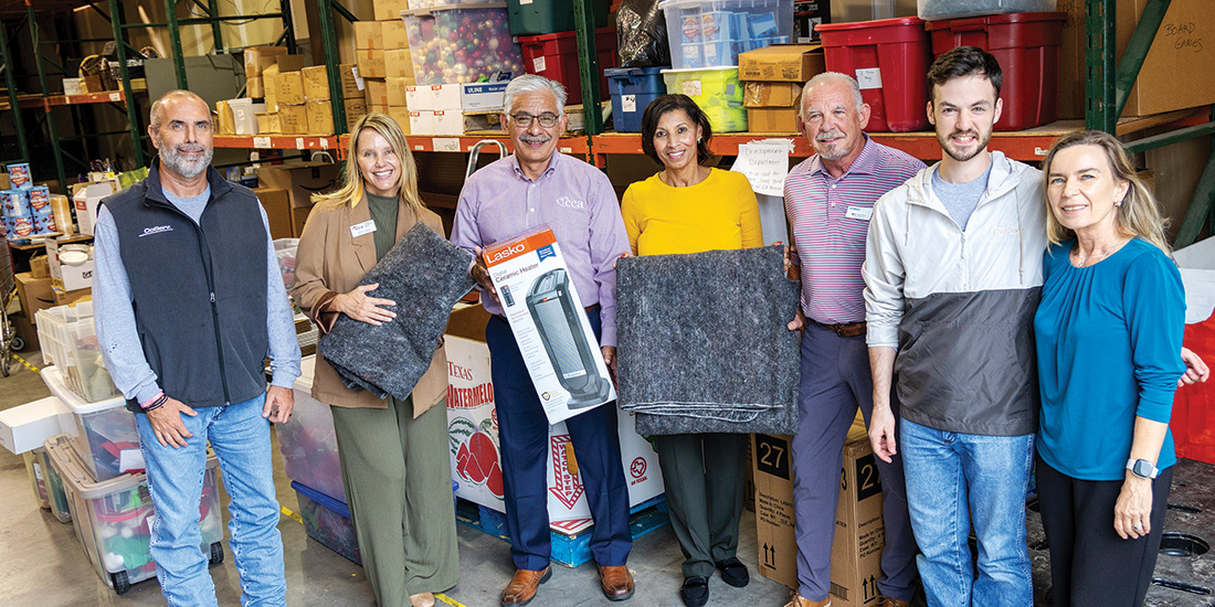 CoServ’s Community Engagement team delivers heaters and blankets to Christian Community Action for the winter. Photos by KEN OLTMANN