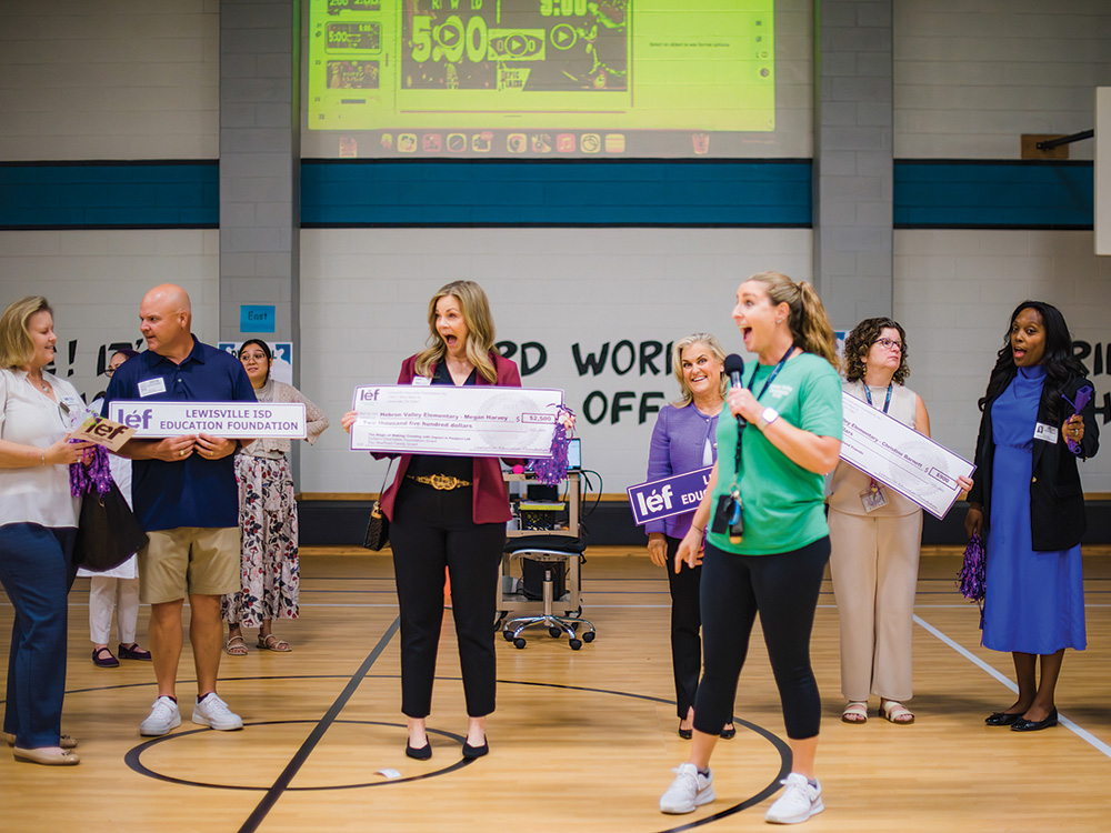 I: Board Chairwoman and District 5 Director, Trisha Sheffield, surprises an Elementary Teacher with a $2,500 grant