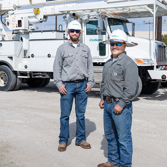 CoServ linemen posing in the Training Yard.