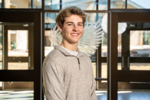 CoServ awards Argyle High School Senior Cooper Gill with a $5,000 scholarship.