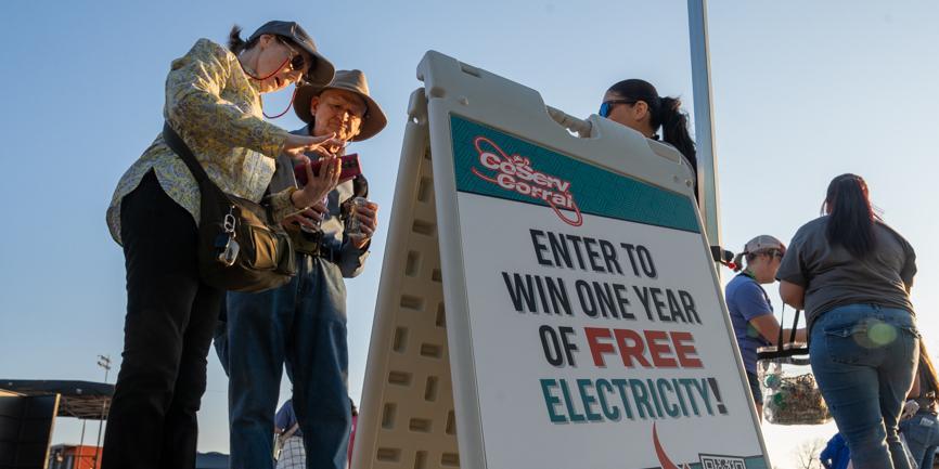 CoServ Customer Engagement and Customer Care employees register Members during a Member/Customer Event at the Little Elm Big Easy at Little Elm Park.