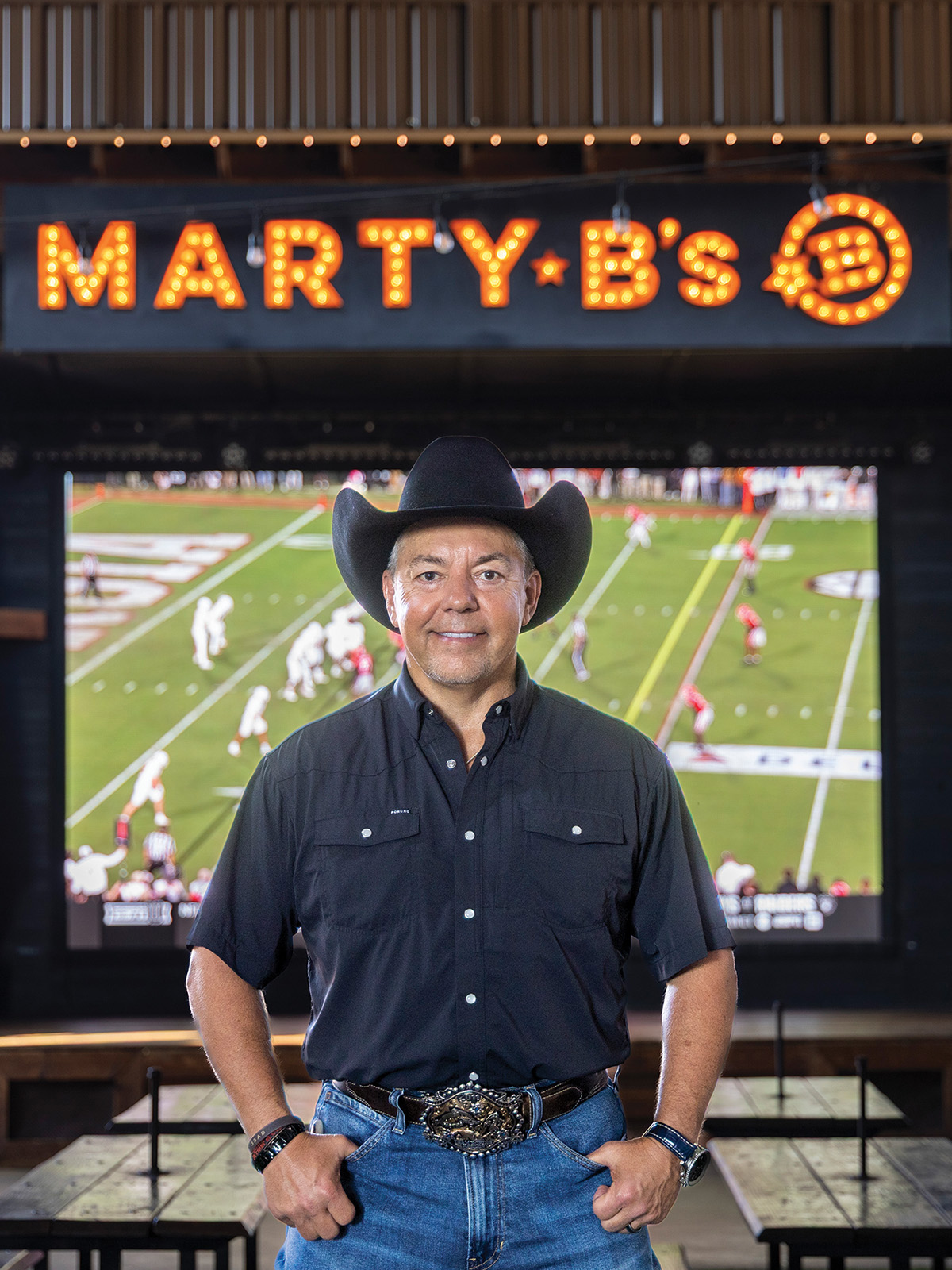 Marty Bryan in the main patio at Marty B’s in Bartonville. Photo by KEN OLTMANN | CoServ