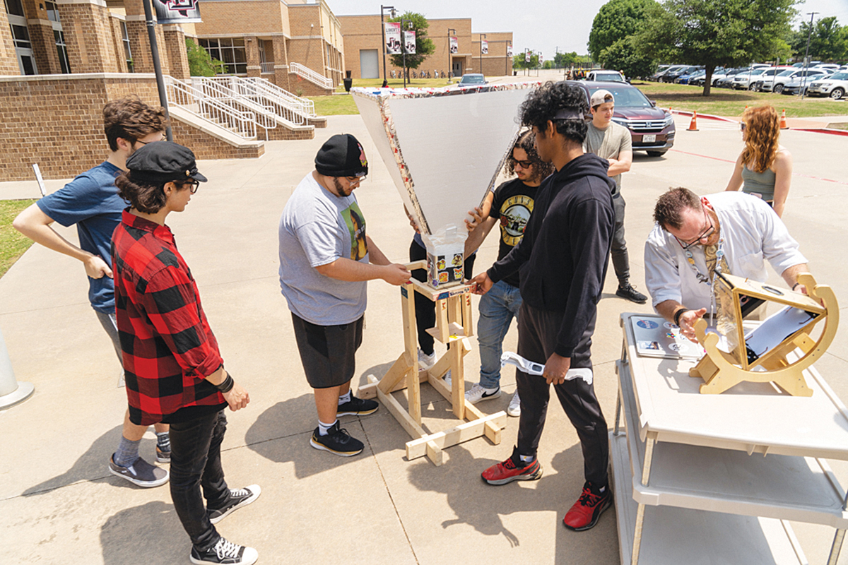 Seniors from Liberty High School in Frisco use astronomy equipment purchased with CCF funds given to the Frisco Education Foundation. Photo by BRIAN ELLEDGE | CoServ