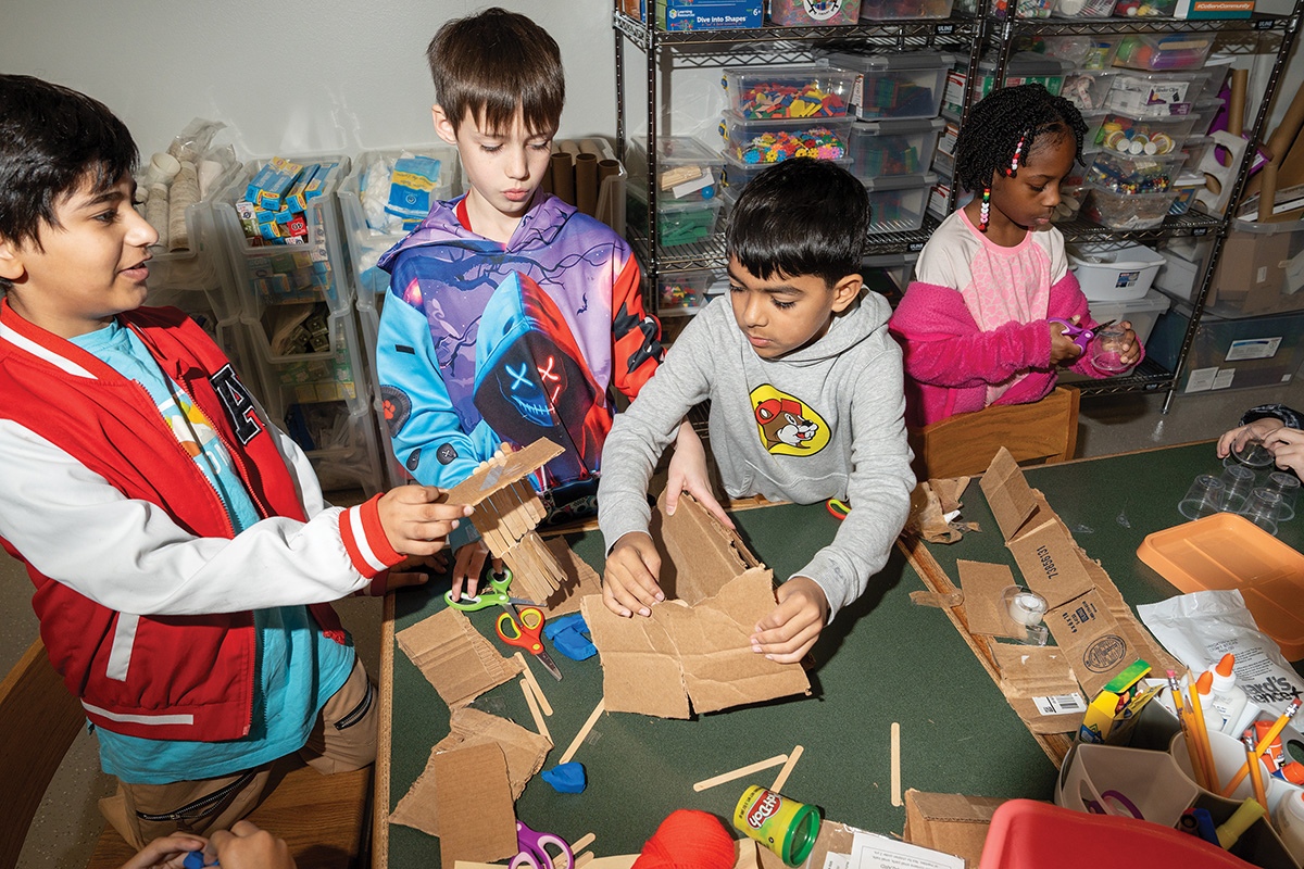 Students participating in an activity at the new STEM Lab funded by the CoServ Academic Project Partners program. Photo by BRIAN ELLEDGE