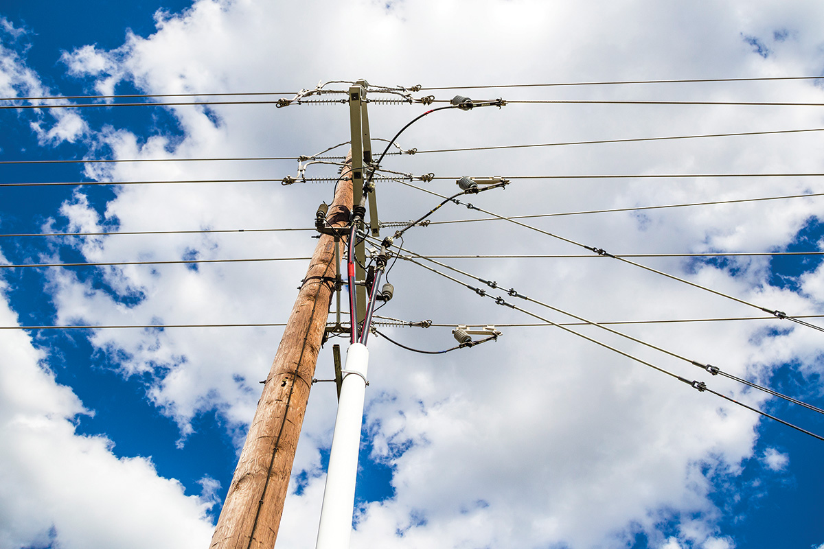 CoServ’s distribution system uses mostly wooden poles, like these, to carry the power out of the substation to our Members.