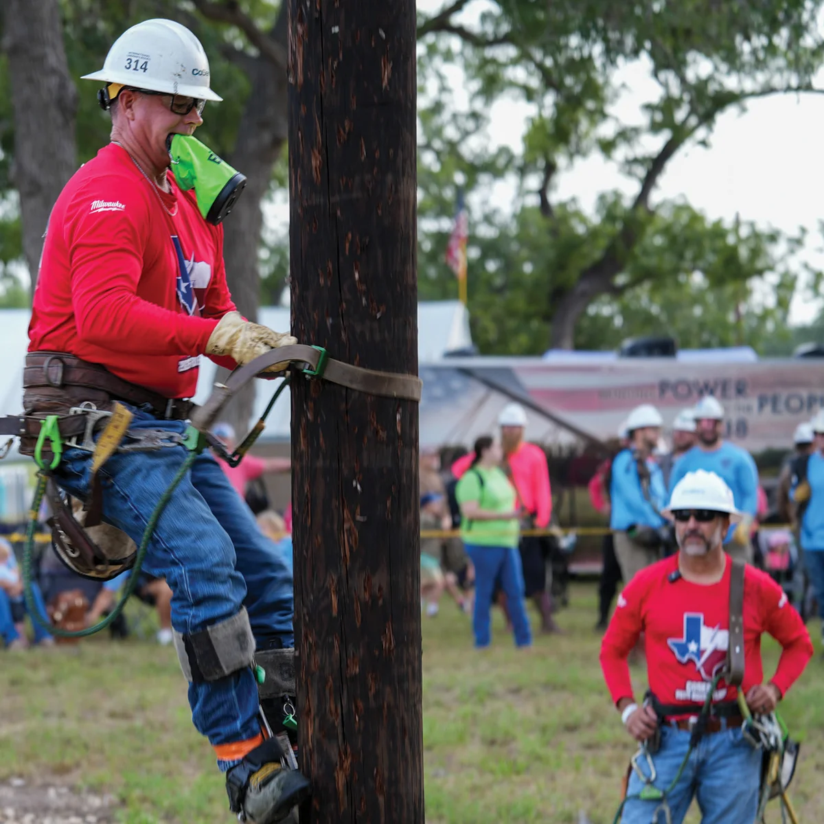 Chris Hammonds competes in the Pole Climb Competition.