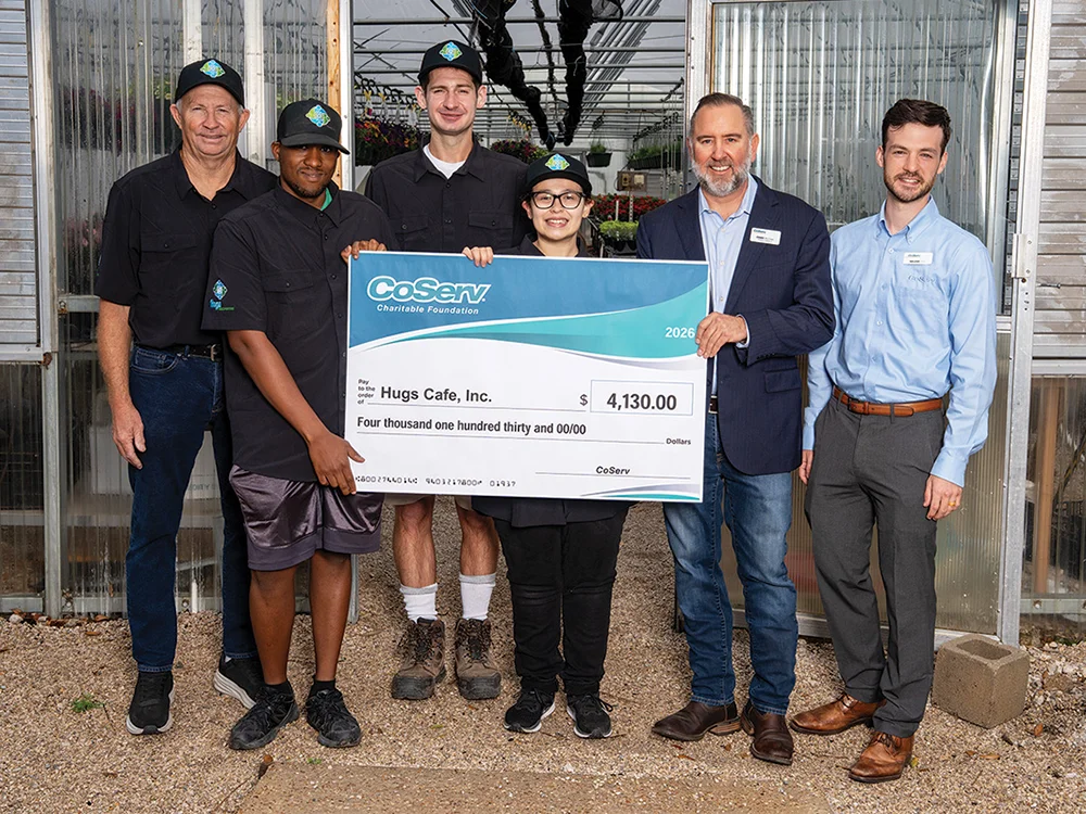 CoServ Charitable Foundation awarded Hugs Café Inc. a grant for $4,130 for the purchase of uniforms for Hugs Café, Hugs Greenhouse, and Hugs Training Academy. Photo by BRIAN ELLEDGE