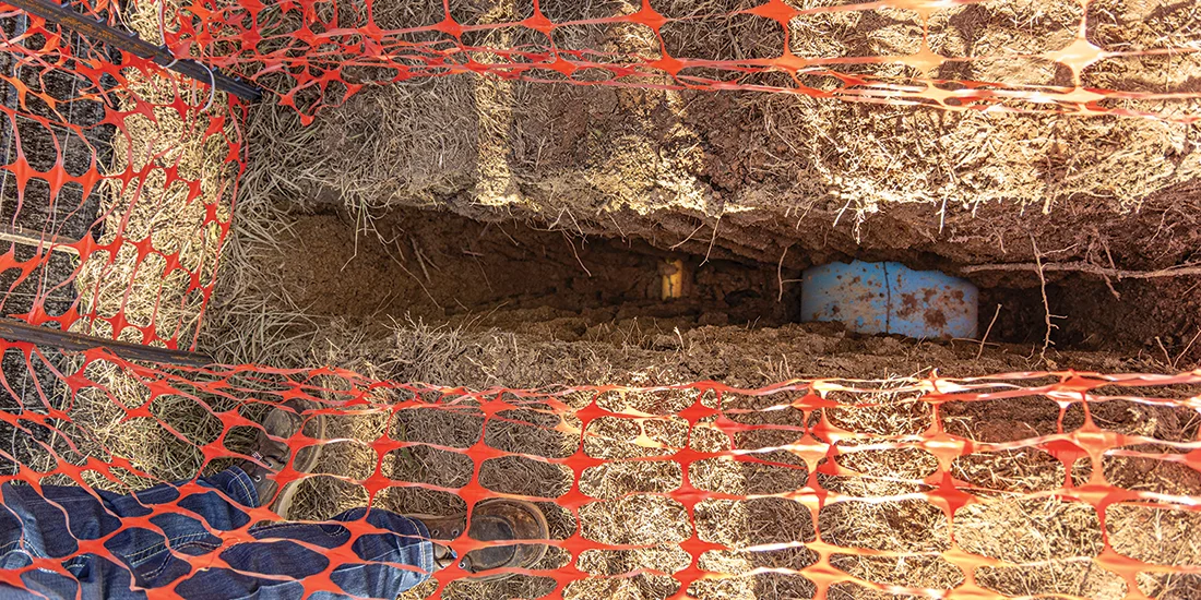 Critical crossing explained: Crews use hydrovacs to safely excavate “windows” that show the location and depth of critical utilities. Also called “potholing”, this shows the CoServ Gas line and a nearby water line. That allowed contractors to safely bore the new sewer line about five feet below these existing lines. Photo by BRIAN ELLEDGE